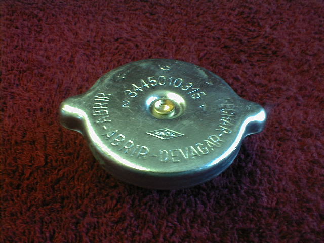 TAPON RADIADOR 7 LBS (40 37X63)